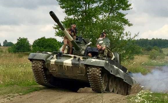 Image for page Battle tank T-55 ride